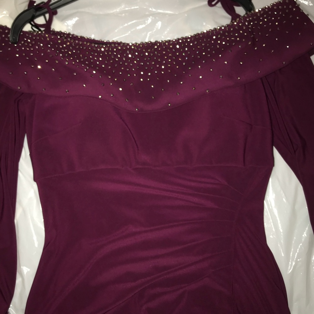 Off the shoulder gown with long sleeves